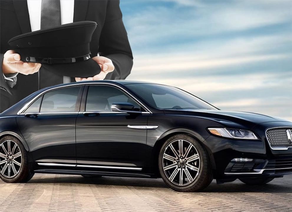 lincoln continental with chauffeur Luxury Lincoln Continental sedan and professional chauffeur for executive black car services in St. Louis."